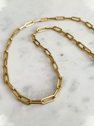 Collier plaqué or à motif nœud